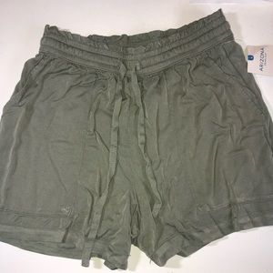 Flowy green shorts with drawstring. NWT. Large pockets on the front.